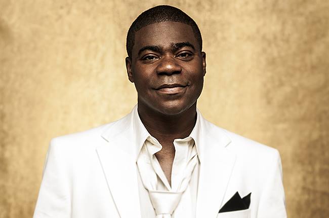 Tracy Morgan returns home, sues Wal-Mart.